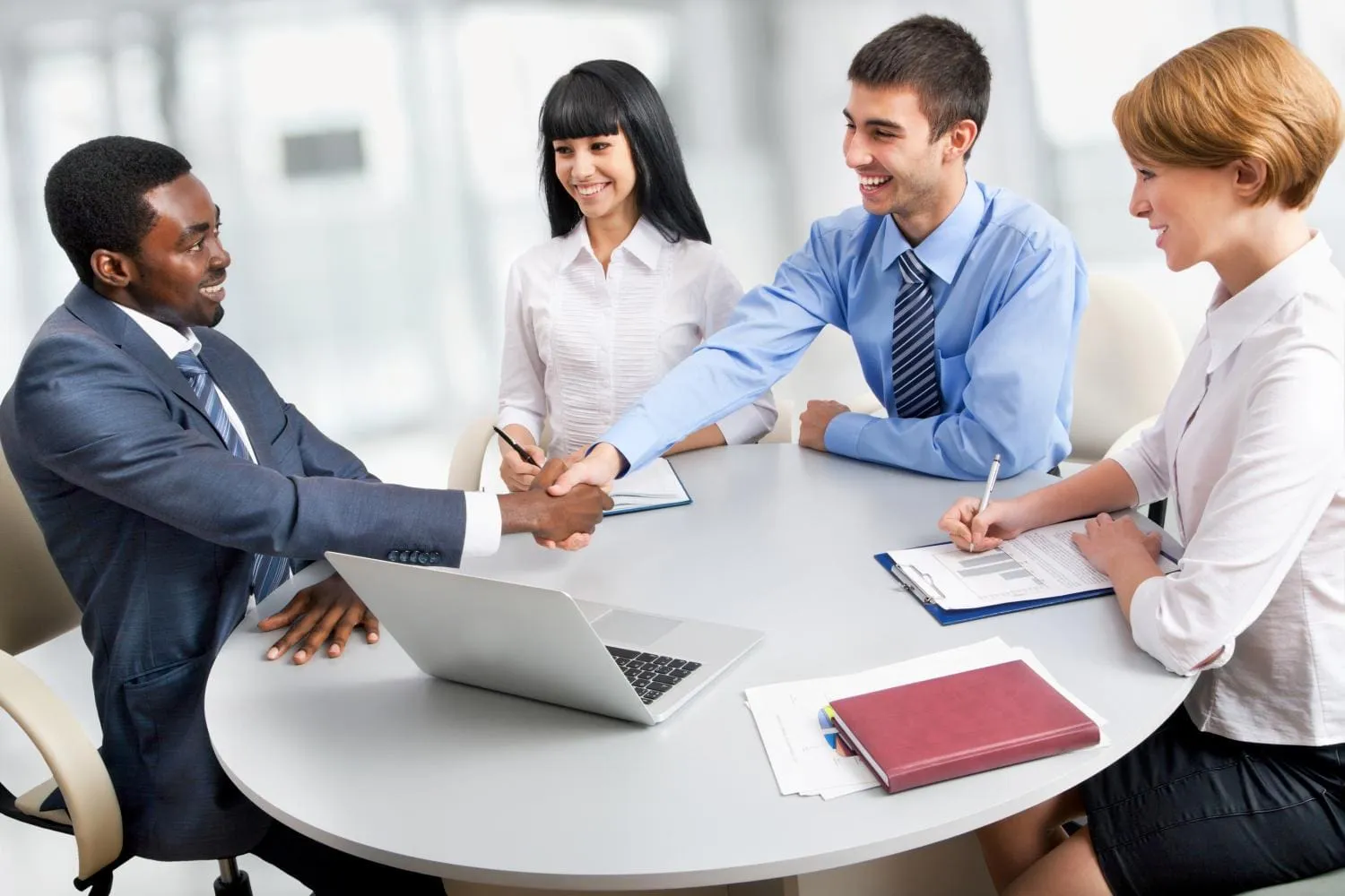 bigstock-Business-people-shaking-hands-38603158.jpg