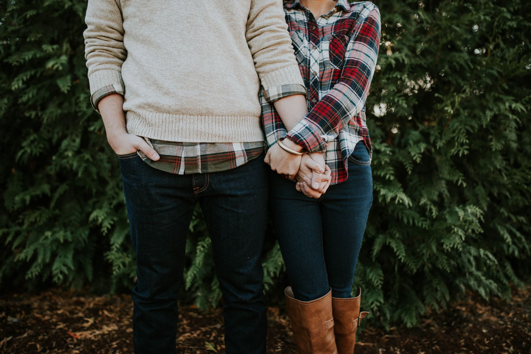 Comon law Couple holding hands. Photo by Brooke Cagle on Unsplash