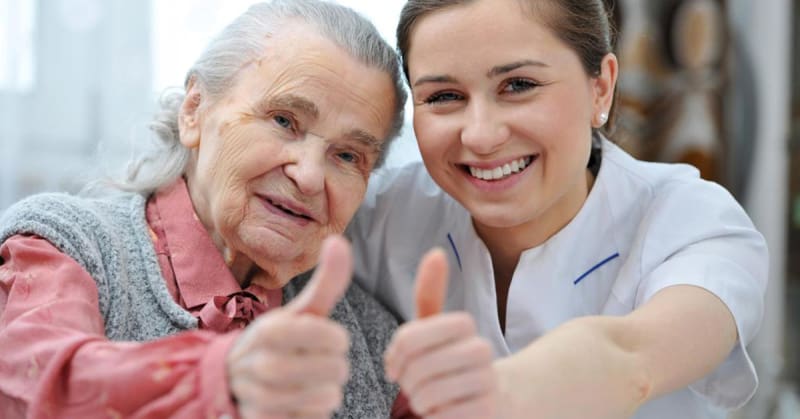 Image of and elderly woman with a live-in caregiver